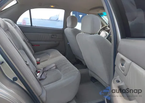 2002 Buick Century Custom z USA, uszkodzony, nr VIN 2G4WS52J021173737